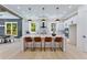 Beautiful kitchen featuring a large island, stainless steel appliances and hardwood floors throughout at 138 Beutell St, Norcross, GA 30071