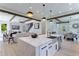 Open-concept kitchen flows into the living and dining areas, creating a seamless and spacious living space at 138 Beutell St, Norcross, GA 30071