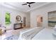 This primary suite features ample natural light, hardwood floors, and a peaceful view of the outdoors at 138 Beutell St, Norcross, GA 30071