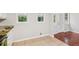 Eat-in kitchen boasts lots of natural light and hardwood flooring at 300 Rocky Cove Trl, Lawrenceville, GA 30044