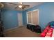 A bedroom with a window and a ceiling fan at 501 Textbook Ct, Lawrenceville, GA 30044