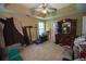 Bedroom features a closet and a ceiling fan at 501 Textbook Ct, Lawrenceville, GA 30044