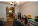 A dining room is next to the kitchen at 501 Textbook Ct, Lawrenceville, GA 30044