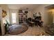 An expansive living area featuring tile floors and a door to the outside at 501 Textbook Ct, Lawrenceville, GA 30044