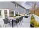 Spacious deck features lounge furniture, a dining set, views of backyard and access to backyard at 1931 Amber Dawn Way, Lawrenceville, GA 30043