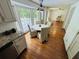Eat-in kitchen featuring a round dining table and chairs and lots of light at 1931 Amber Dawn Way, Lawrenceville, GA 30043