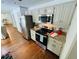 Modern kitchen featuring stainless steel appliances and granite countertops at 1931 Amber Dawn Way, Lawrenceville, GA 30043