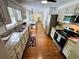 Spacious kitchen with stainless steel appliances and granite countertops at 1931 Amber Dawn Way, Lawrenceville, GA 30043