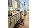 Kitchen featuring a stainless steel sink, granite countertops, and hardwood floors at 1931 Amber Dawn Way, Lawrenceville, GA 30043