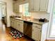 Kitchen featuring granite countertops, stainless steel appliances, and hardwood floors at 1931 Amber Dawn Way, Lawrenceville, GA 30043