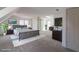 Large bedroom features a skylight, recessed lighting, hardwood furniture and a sliding barn door at 1931 Amber Dawn Way, Lawrenceville, GA 30043