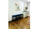 Stylish wet bar features dark cushioned seating and attractive floral art at 1931 Amber Dawn Way, Lawrenceville, GA 30043