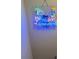 Fun neon art with cocktail graphic and humorous slogan, adding character to the home's decor at 1932 River Crest Way, Lawrenceville, GA 30045