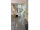 Bright home foyer with stairs, modern flooring, and a view of the living space at 1932 River Crest Way, Lawrenceville, GA 30045