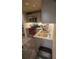 Efficient kitchen setup with stainless steel appliances, granite countertops, and under-cabinet lighting at 1932 River Crest Way, Lawrenceville, GA 30045