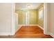 Dining room featuring hardwood floors and natural light from a large window at 242 12Th Ne St # 1A, Atlanta, GA 30309