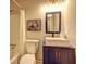 Bathroom features a shower, toilet, and modern vanity with new sink at 3963 Holland Ct, Douglasville, GA 30135