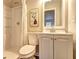 Bathroom featuring a toilet, vanity, framed mirror, and walk-in shower at 3963 Holland Ct, Douglasville, GA 30135