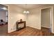 Bright dining room features hardwood floors and table with coffee stand at 3963 Holland Ct, Douglasville, GA 30135