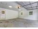 The garage features concrete floors, white walls, and two windows at 3963 Holland Ct, Douglasville, GA 30135