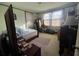 Bright bedroom with lots of natural light and simple, functional furnishings at 5111 Newark Ave, Clarkdale, GA 30111