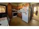 Functional kitchen with classic cabinetry, practical layout, and appliances at 5111 Newark Ave, Clarkdale, GA 30111