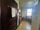 Functional kitchen featuring wood cabinets and linoleum flooring, with natural light at 5111 Newark Ave, Clarkdale, GA 30111