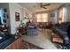 Spacious living room featuring neutral carpet, ample seating, and bright natural light at 5111 Newark Ave, Clarkdale, GA 30111