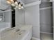 Well-lit bathroom features a large vanity and a view of the tub and toilet at 2121 Crescentview Dr, Lawrenceville, GA 30044