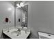 Bathroom with a big mirror, faucet and neutral-colored walls at 2121 Crescentview Dr, Lawrenceville, GA 30044