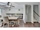 Open floor plan with dining table adjacent to the staircase at 2121 Crescentview Dr, Lawrenceville, GA 30044