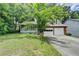 Charming two-story home featuring a covered porch and a traditional brick and siding exterior at 2121 Crescentview Dr, Lawrenceville, GA 30044