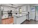 Updated kitchen with granite countertops, stainless steel appliances, and breakfast bar at 2121 Crescentview Dr, Lawrenceville, GA 30044