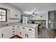 Bright kitchen with granite countertops, stainless steel appliances and view to second floor at 2121 Crescentview Dr, Lawrenceville, GA 30044