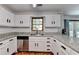 Bright kitchen with granite countertops, stainless steel appliances and lots of cabinets at 2121 Crescentview Dr, Lawrenceville, GA 30044