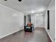 Cozy living room features hardwood floors, neutral paint, and comfortable armchair at 2121 Crescentview Dr, Lawrenceville, GA 30044