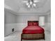 Generously sized main bedroom with soft carpet and tray ceiling at 2121 Crescentview Dr, Lawrenceville, GA 30044
