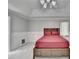 Comfortable main bedroom with a tray ceiling and soft carpet at 2121 Crescentview Dr, Lawrenceville, GA 30044