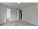 Bright carpeted bedroom with neutral walls, and an open closet at 2355 Glen Chase Ln, Lawrenceville, GA 30044