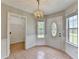 Entry hallway with tile flooring and access to laundry room at 2355 Glen Chase Ln, Lawrenceville, GA 30044
