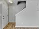 Bright entryway with modern flooring, staircase, and neutral wall paint at 2355 Glen Chase Ln, Lawrenceville, GA 30044