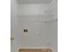 Laundry room with tile flooring and shelving at 2355 Glen Chase Ln, Lawrenceville, GA 30044