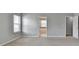 The spacious main bedroom has an ensuite bathroom and walk-in closet at 2355 Glen Chase Ln, Lawrenceville, GA 30044