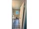 Doorway view of bathroom includes a toilet, tub, and updated sink vanity at 3730 Clovis Nw Ct, Atlanta, GA 30331