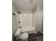 Bathroom with white subway tiles and neutral paint at 3730 Clovis Nw Ct, Atlanta, GA 30331