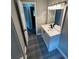 Well-lit bathroom features a modern vanity, faucet, and lighting at 3730 Clovis Nw Ct, Atlanta, GA 30331
