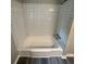 Bathroom featuring a newly tiled tub/shower combination with white subway tile at 3730 Clovis Nw Ct, Atlanta, GA 30331