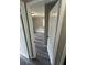 A view into a bedroom with gray wood floors and neutral walls at 3730 Clovis Nw Ct, Atlanta, GA 30331