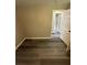 Bedroom featuring luxury vinyl plank flooring and neutral paint at 3730 Clovis Nw Ct, Atlanta, GA 30331