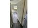Bedroom view shows the gray vinyl flooring and a view to the outside at 3730 Clovis Nw Ct, Atlanta, GA 30331